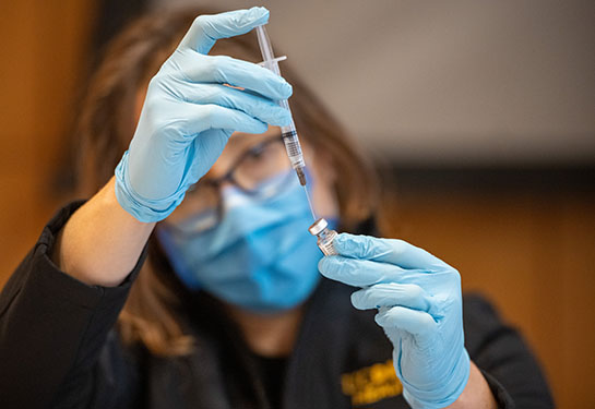 health care provider with syringe 