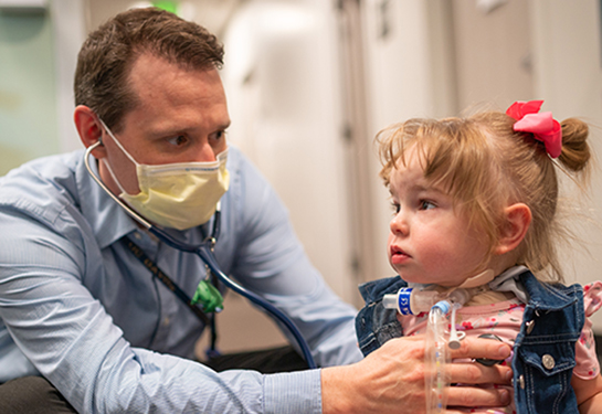 Man with toddler girl