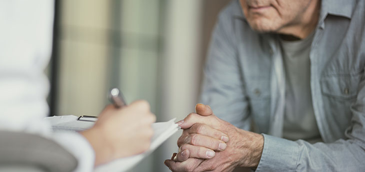 patient and doctor meeting in a medical room. 