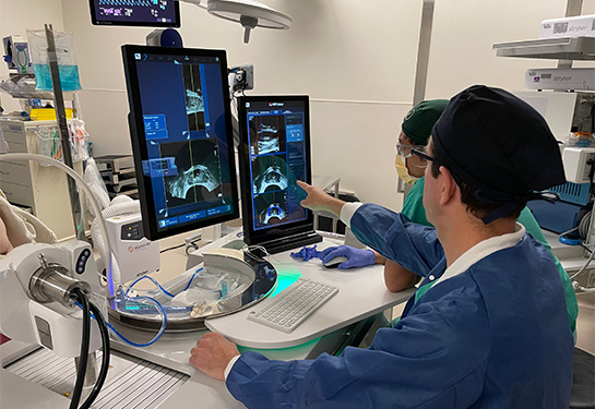 Dr. Dall’Era in front of screens