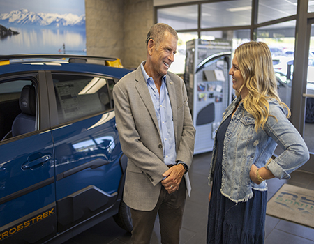 Photo of Kate McCarver talking to Dr. Randall
