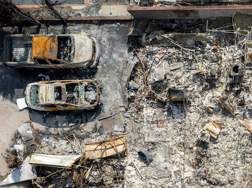 Overhead view of cars and structures burned by the Eaton Fire in Altadena, Calif.